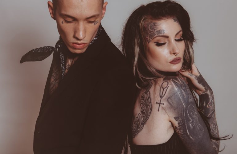 tattooed man and woman